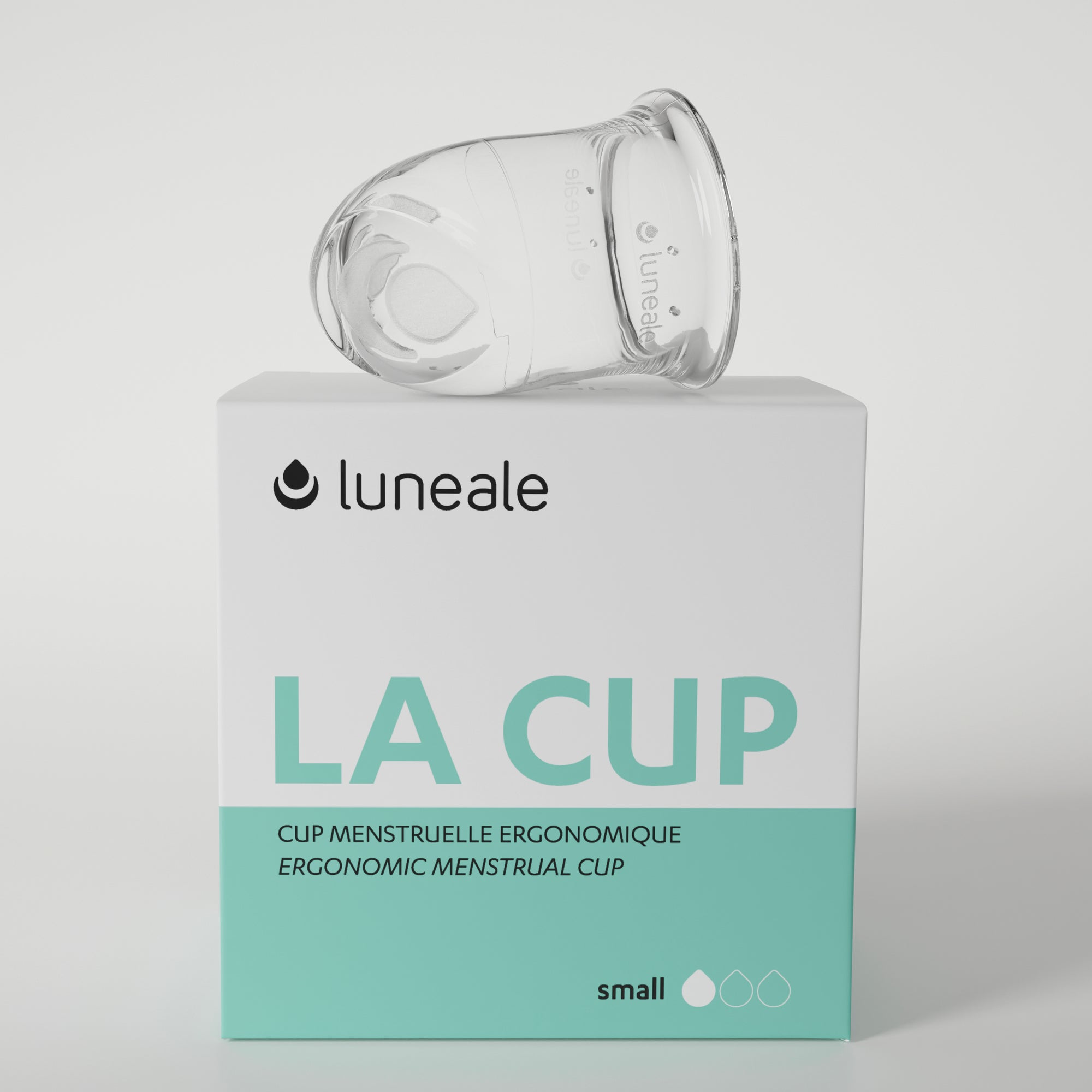 Packshot de La Cup Luneale taille S avec sa boîte : cup menstruelle française, idéale pour les flux légers et les débutantes. Protection périodique durable, confortable et adaptée au sport et au quotidien.