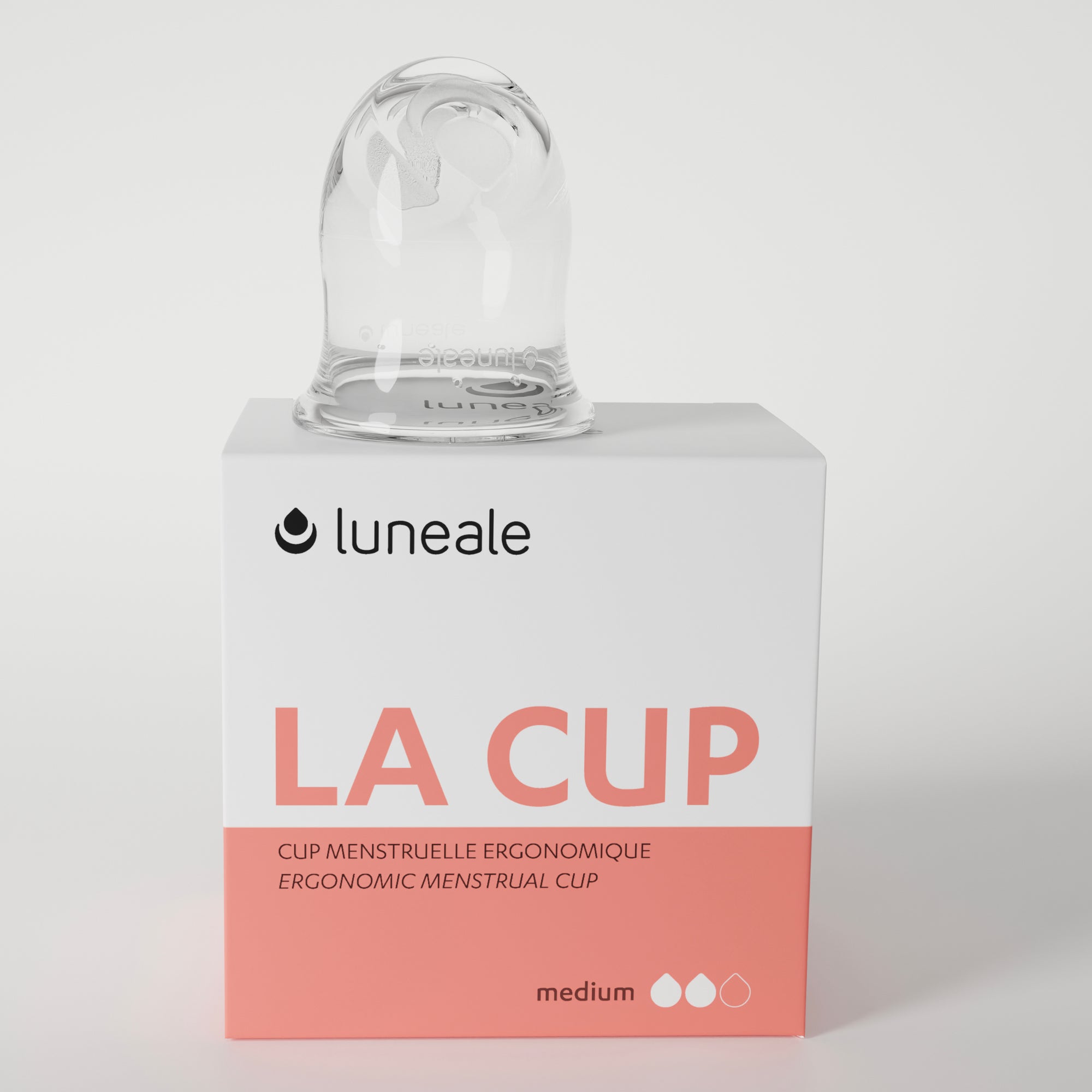 Packshot de La Cup Luneale taille M avec sa boîte : cup menstruelle française, idéale pour les flux moyens. Protection périodique durable, confortable et adaptée au sport et au quotidien.